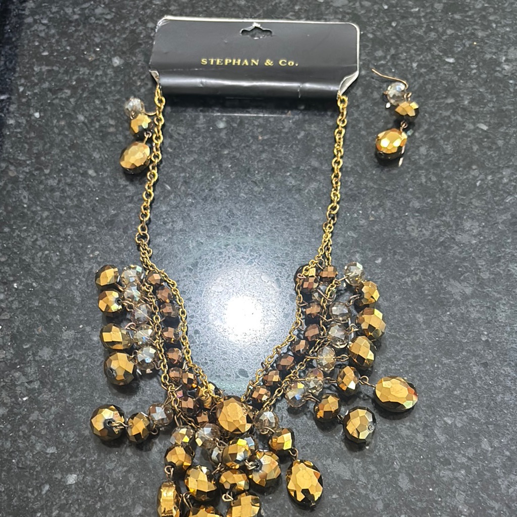 Gold Cascading Bead Necklace With Vintage Charm